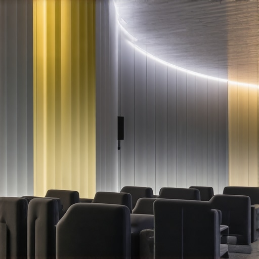 Futuristic home theater with sophisticated ambient lighting and diffusers